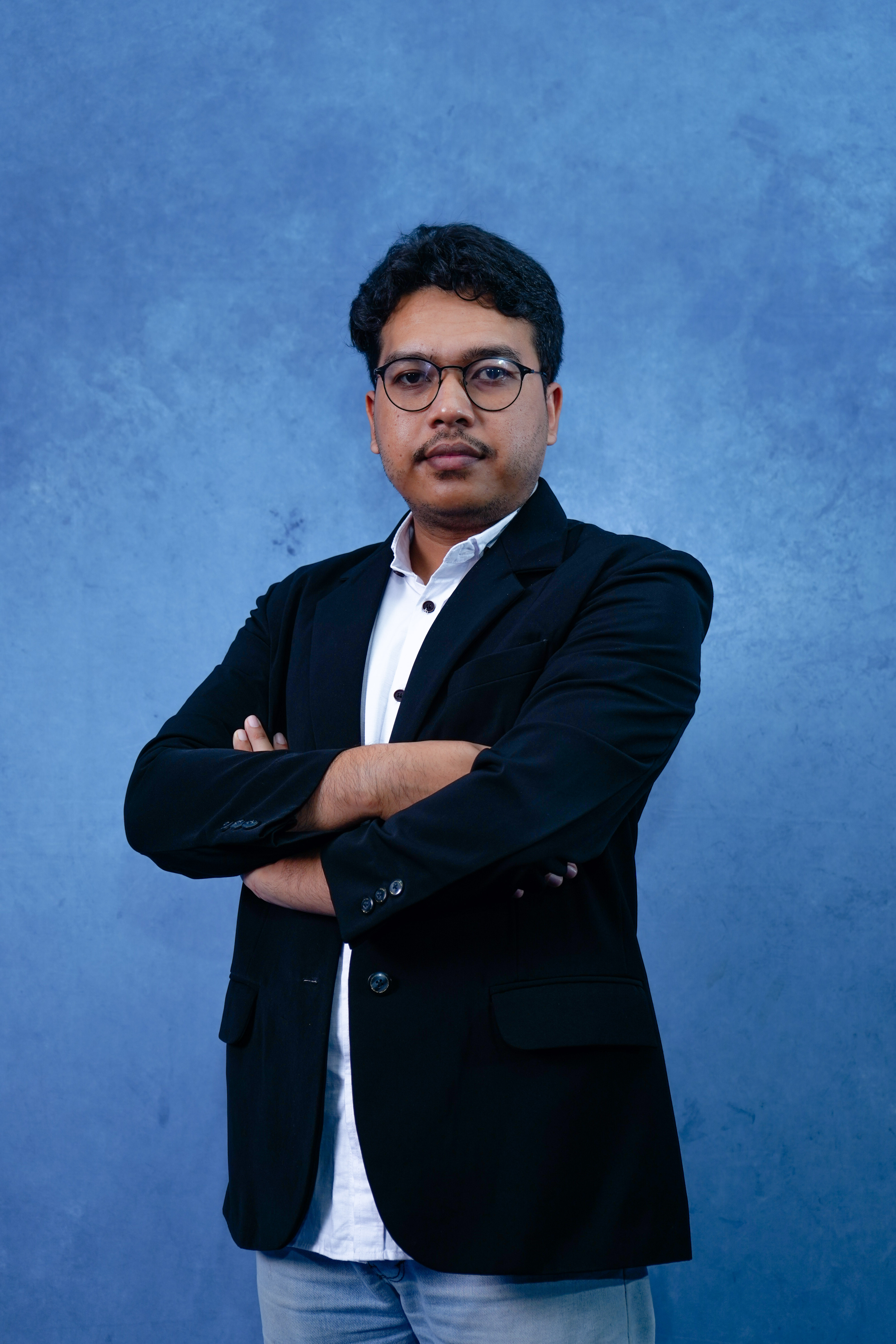 Professional headshot of Anna Garcia, mobile app developer with smartphone and laptop, confident pose, modern office environment, tech-savvy appearance